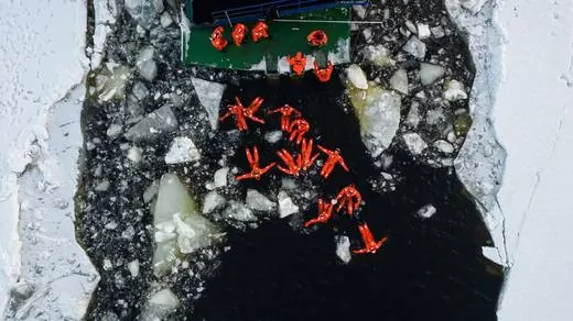 Ice floating beside the Polar Explorer icebreaker